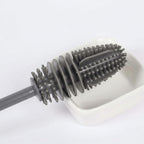 Gray scrubber brush on a white background