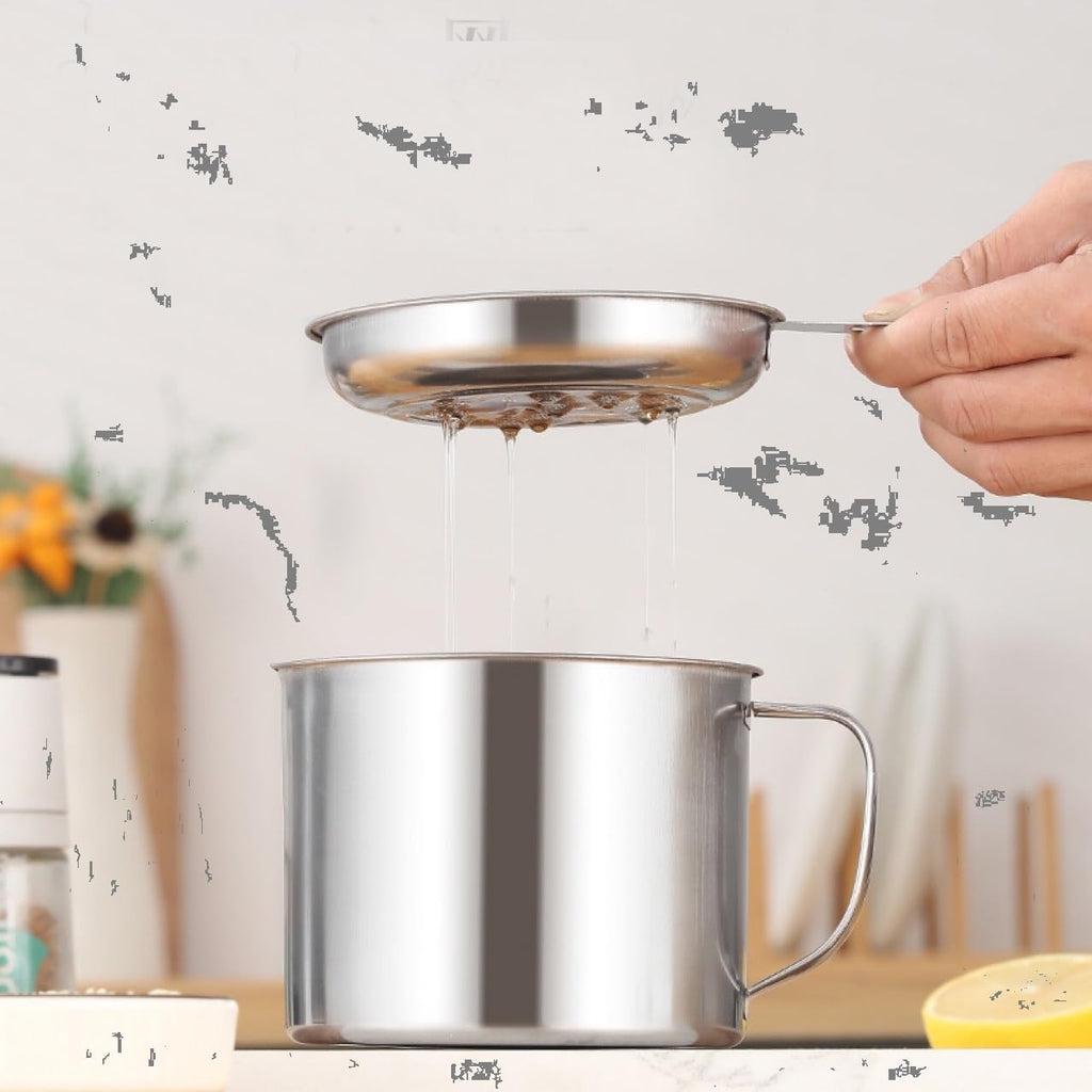 oil dropping in a container from the strainer