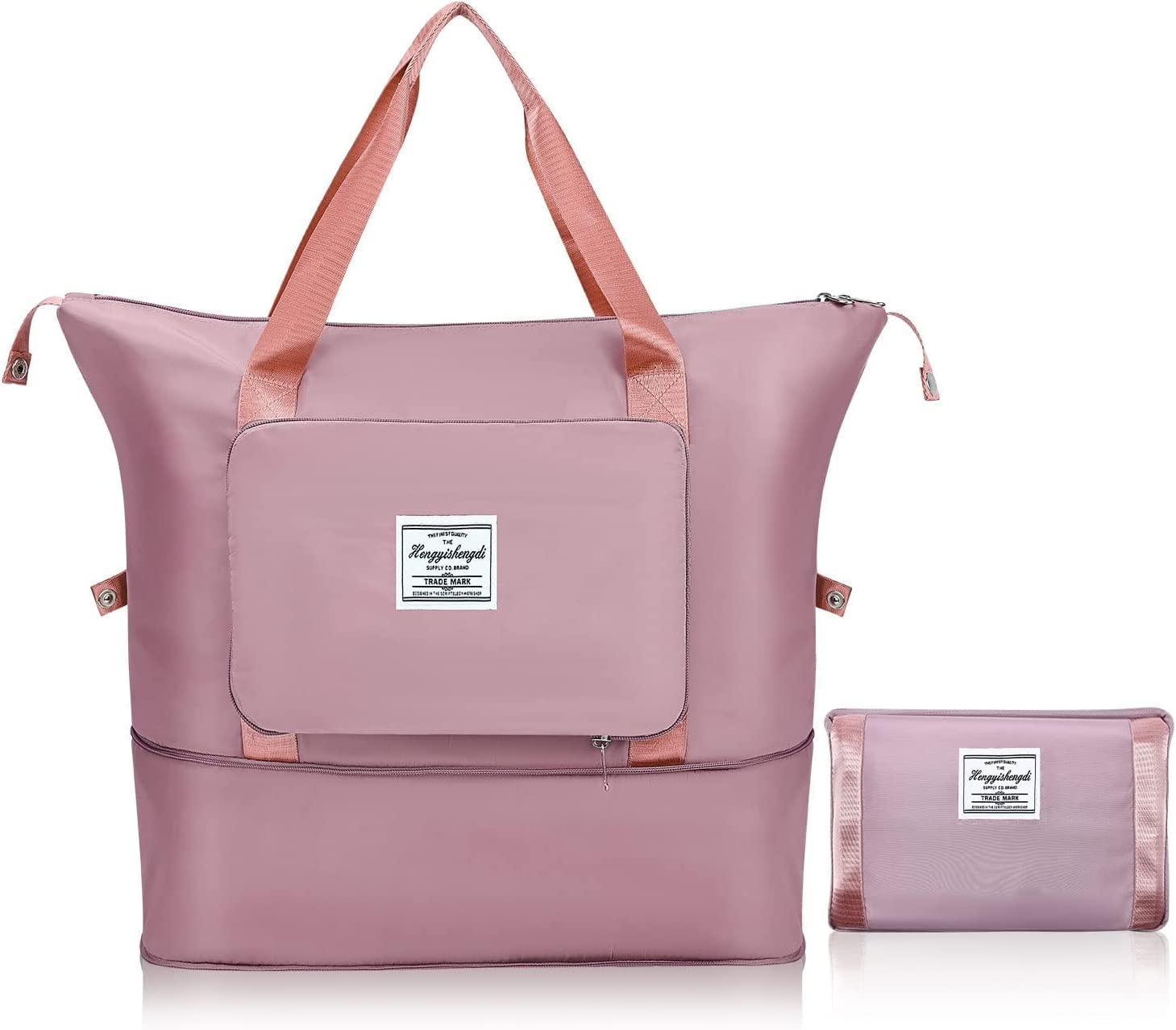 Pink travel bag with matching pouch on a white background