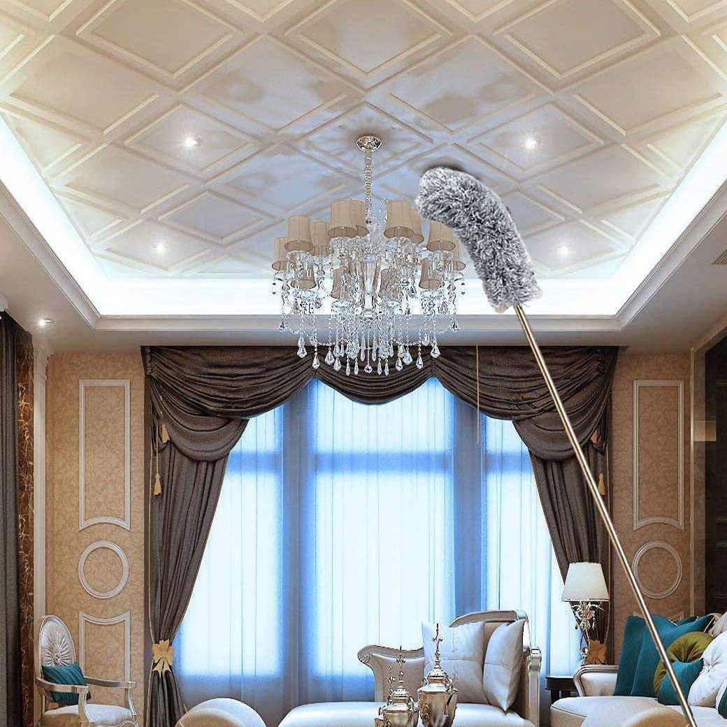 Luxurious room with a chandelier, decorative curtains, and elegant decor.